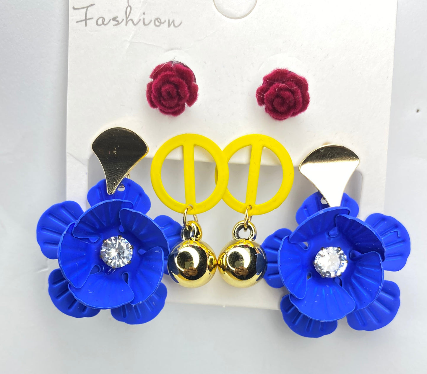 Blue floral earrings with yellow  accents